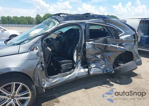 2023 Ford Edge Titanium z USA, uszkodzony, nr VIN 2FMPK4K94PBA11423